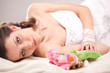 Photo: studio photograph of a bride lying on the floor studio photograph of a bride lying on the floor