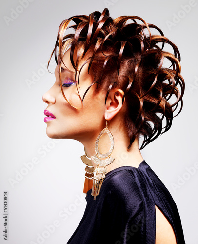 Photo: Portrait of rhe beautiful woman with fashion hairstyle Portrait of rhe beautiful woman with fashion hairstyle