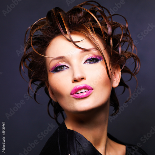 Photo: woman with fashion hairstyle and bright sexy pink lips woman with fashion hairstyle and bright sexy pink lips