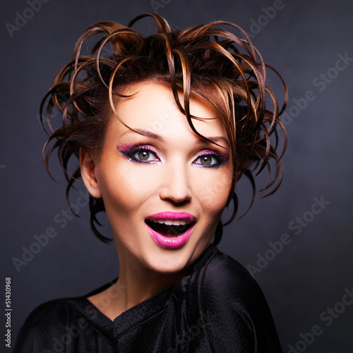 Photo: beautiful expressive woman with fashion hairstyle beautiful expressive woman with fashion hairstyle