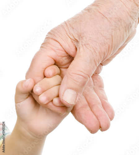 Photo: hands of a grandfather and child. isolated on white hands of a grandfather and child. isolated on white