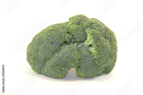 Photo: Fresh broccoli vegetable isolated on white background Fresh broccoli vegetable isolated on white background