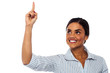 Corporate woman pointing upwards