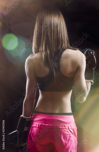Photo: back muscled young female boxer, fitness back muscled young female boxer, fitness