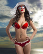 splendid girl in bikini with hat on sea