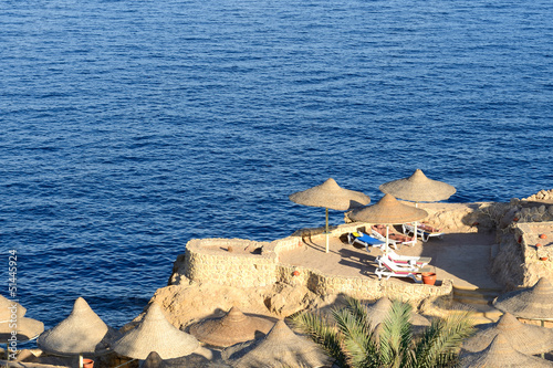 Photo: Sunset at Naama Bay, Red Sea and beach, Sharm el Sheikh, Egypt Sunset at Naama Bay, Red Sea and beach, Sharm el Sheikh, Egypt