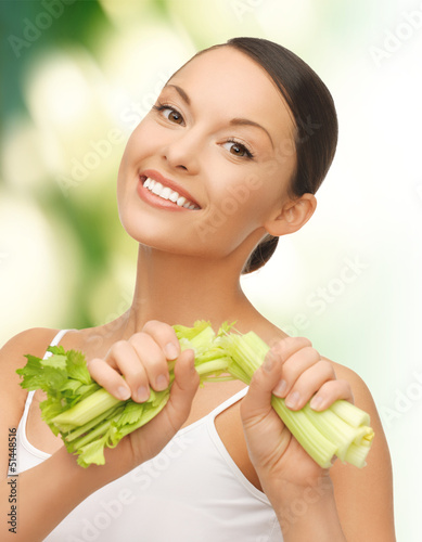 Photo: woman with fresh celery woman with fresh celery