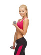 young sporty woman with light dumbbells