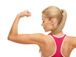 sporty woman showing her biceps