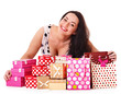 Woman holding gift box at birthday party.