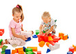 Children play building blocks.