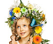 Child with gift box and flower.