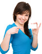 Young woman is holding visit card