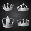 Set of old silver crowns isolated.
