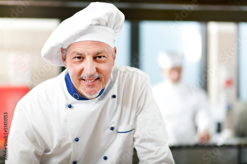 Photo: Chef portrait in the kitchen Chef portrait in the kitchen