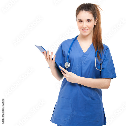 Photo: Young nurse isolated on white Young nurse isolated on white