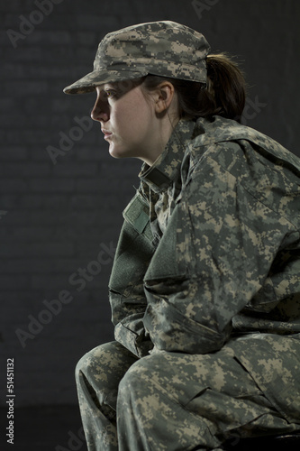 Photo: Young army woman dealing with Post Traumatic Stress Disorder Young army woman dealing with Post Traumatic Stress Disorder