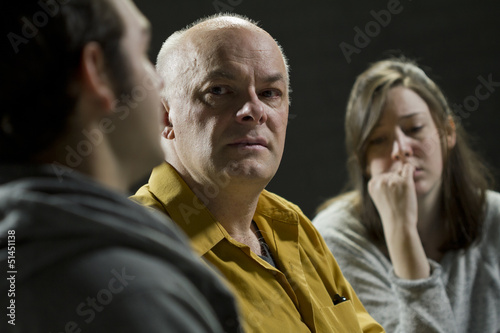 Photo: Young man crying from giving his testimony Young man crying from giving his testimony