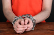 Prisoner in handcuffs close-up