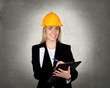 Attractive engineer with clipboard