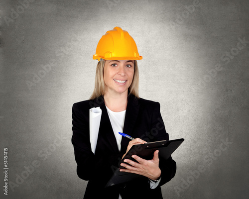 Photo: Attractive engineer with clipboard Attractive engineer with clipboard