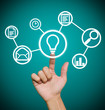 Foto: Hand pointing to business icons Hand pointing to business icons