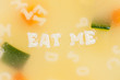 Alphabet soup drawing the words Eat Me