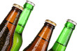 Coloured glass beer bottles isolated on white