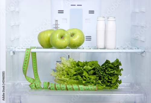Photo: Open refrigerator with diet food Open refrigerator with diet food