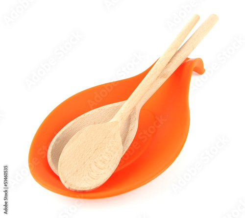 Photo: Bright stand spoons isolated on white Bright stand spoons isolated on white
