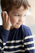 Portrait of boy with mobile phone