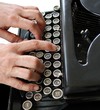 typing on vintage typewriter
