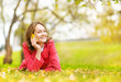 portrait of a smiling beautiful woman talking on the phone