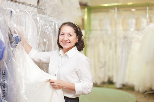 Photo: shop consultant at shop of wedding fashion shop consultant at shop of wedding fashion