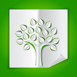 Vector: tree on green made of paper cut out tree on green made of paper cut out