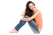 Photo: Attractive caucasian girl sitting on floor Attractive caucasian girl sitting on floor