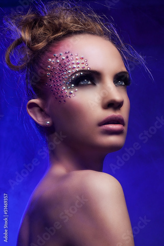 Photo: Beautiful woman with fantasy makeup Beautiful woman with fantasy makeup