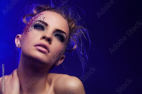 Photo: Beautiful woman with fantasy makeup Beautiful woman with fantasy makeup