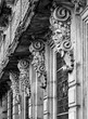 Historic building facade with masks