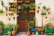 Foto: Building facade with lot of flower pots Building facade with lot of flower pots