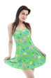 Photo: Young long haired woman wearing green dress, pose Young long haired woman wearing green dress, pose