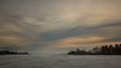 cloudy winter sunset on river