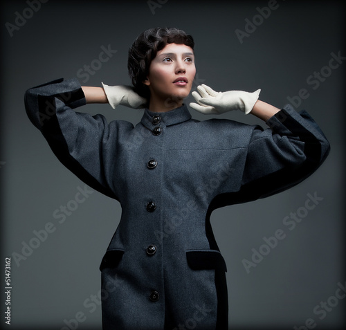 Photo: Aristocratically Styled Woman in Autumn Outfit. Retro Fashion Aristocratically Styled Woman in Autumn Outfit. Retro Fashion