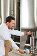 Foto: Beer brewer in his brewery Beer brewer in his brewery