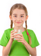 Girl holding a glass of milk