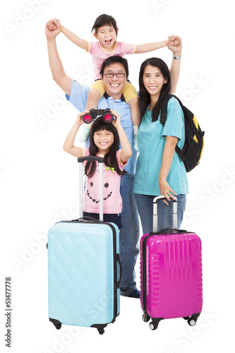 Photo: happy family with suitcase going on holiday happy family with suitcase going on holiday