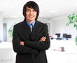 Photo: Asian businessman in his office Asian businessman in his office
