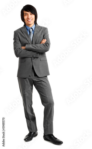 Photo: Smart asian business man isolated on white background Smart asian business man isolated on white background