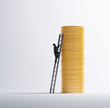 Man climbing a pile of coins