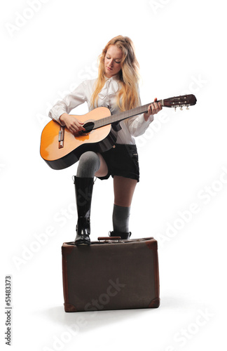 Photo: girl playing guitar girl playing guitar